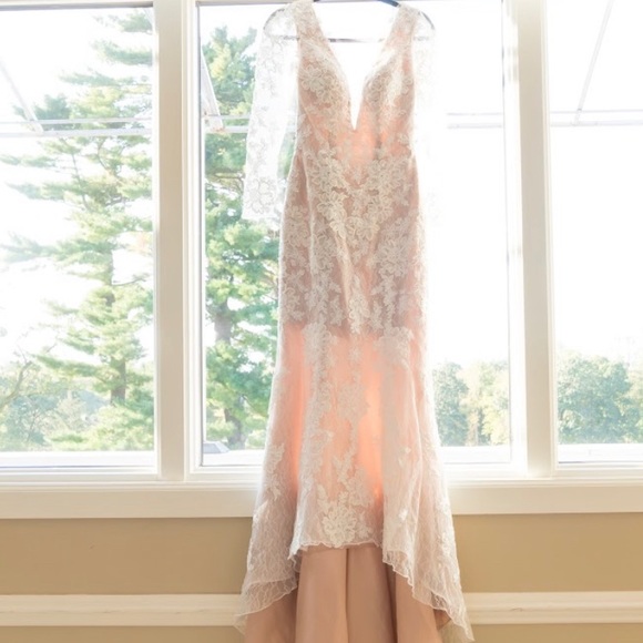 Petite long sleeve plunging v-neckline ivory lace wedding gown